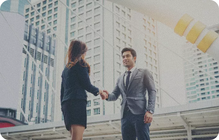 Business professionals shaking hands